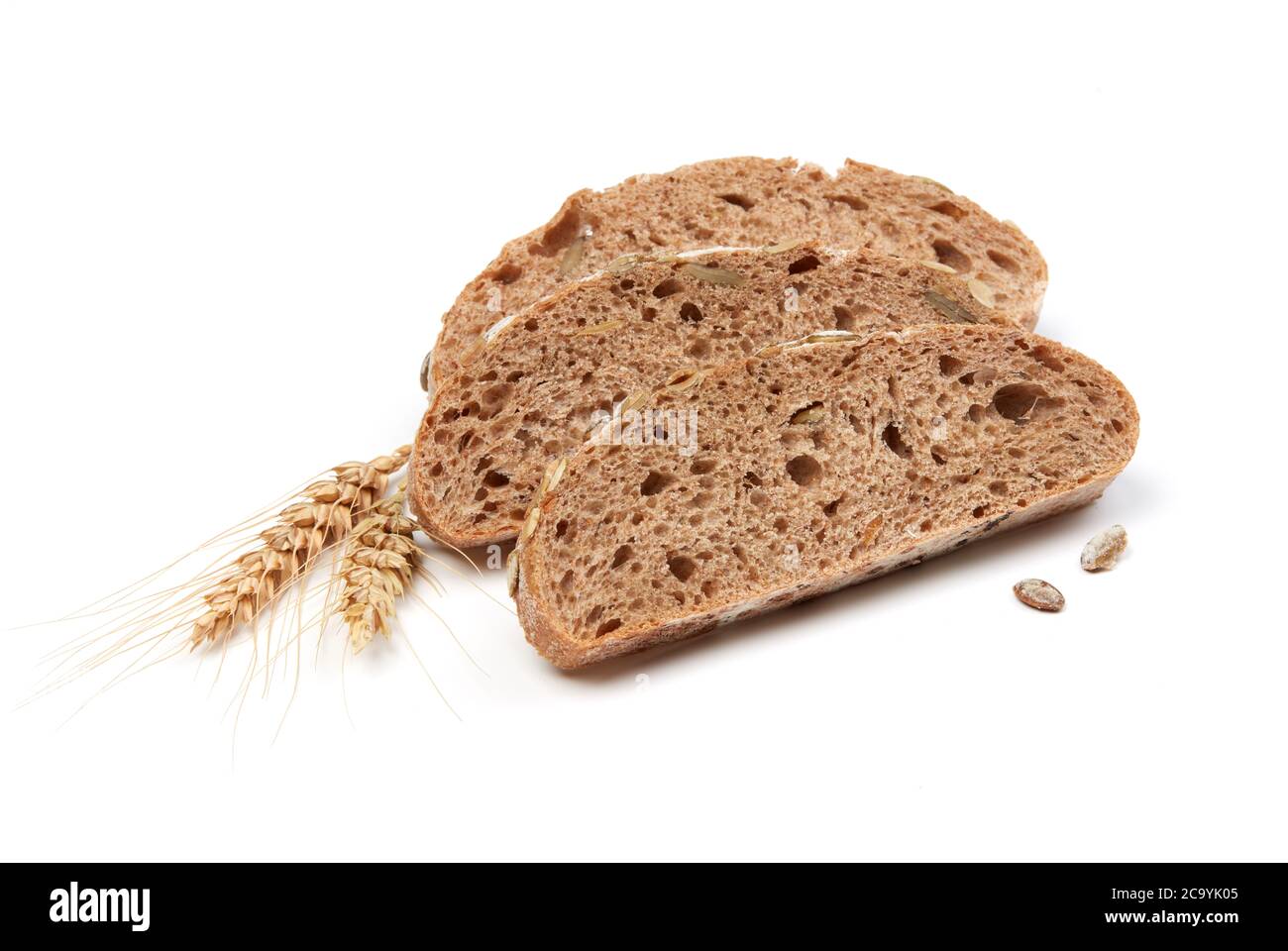 Bread slices  and wheat isolated on white Stock Photo