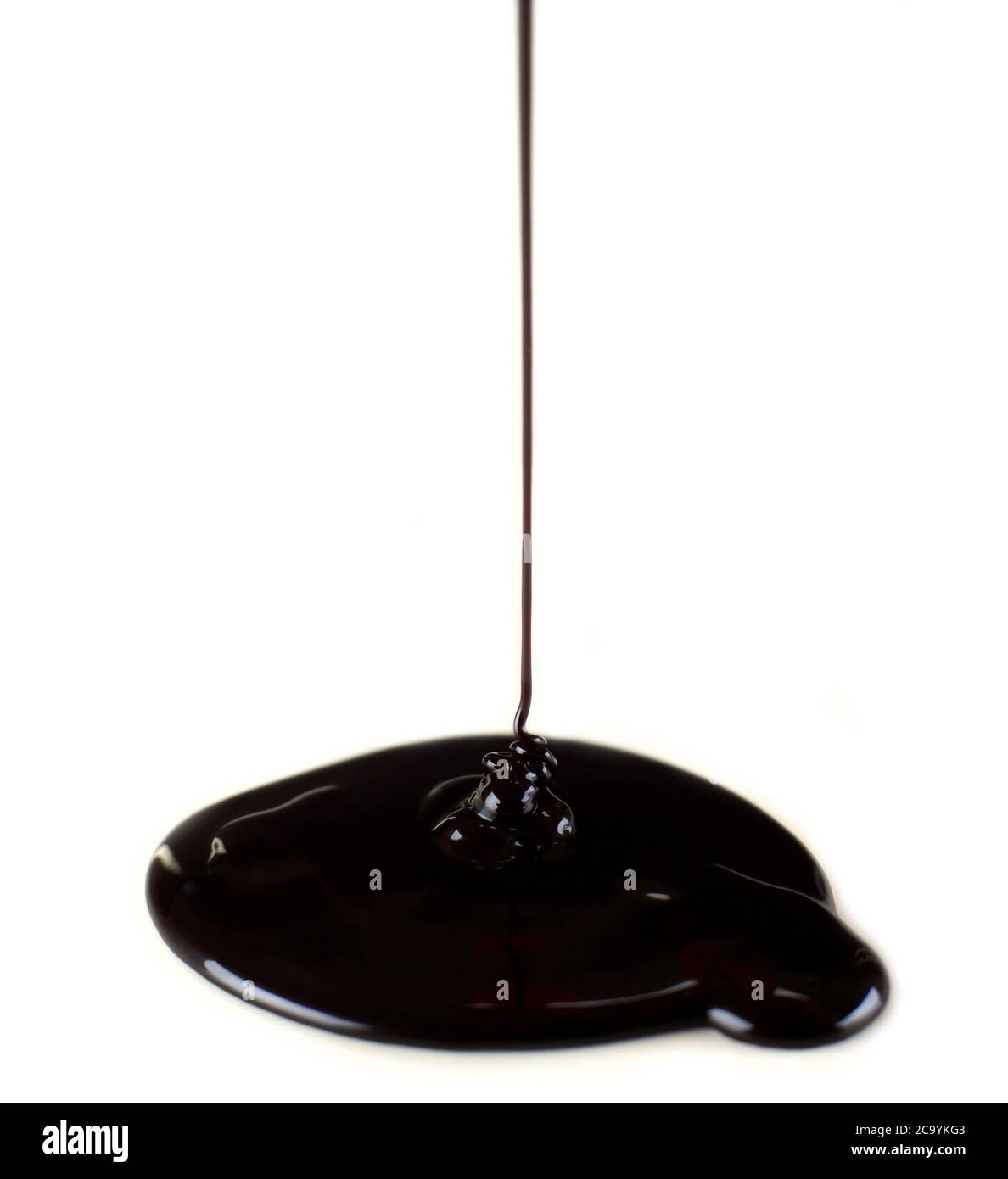 Chocolate drip isolated on white Stock Photo Alamy