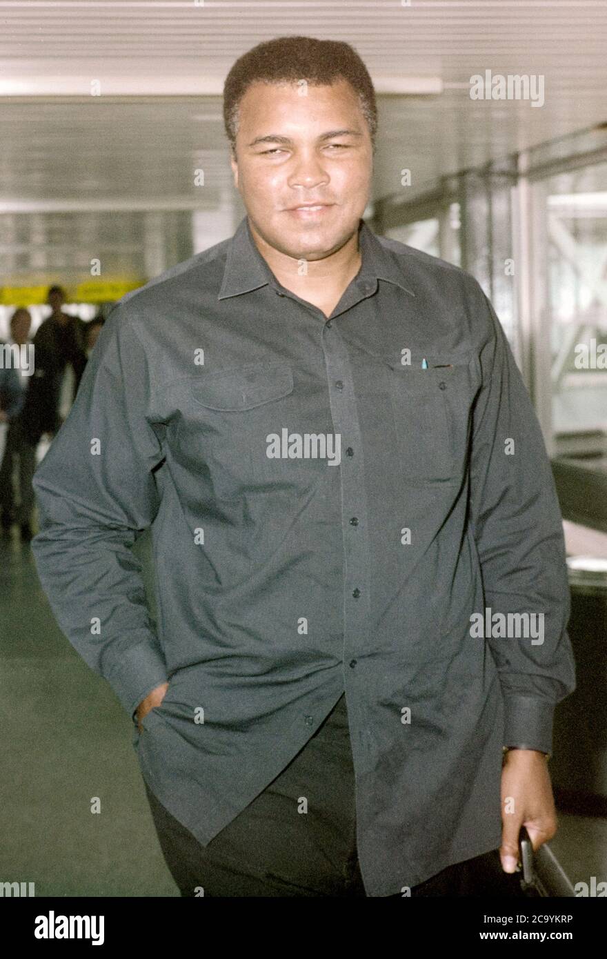 Muhammad Ali arriving at London Heathrow Airport 1989 Stock Photo