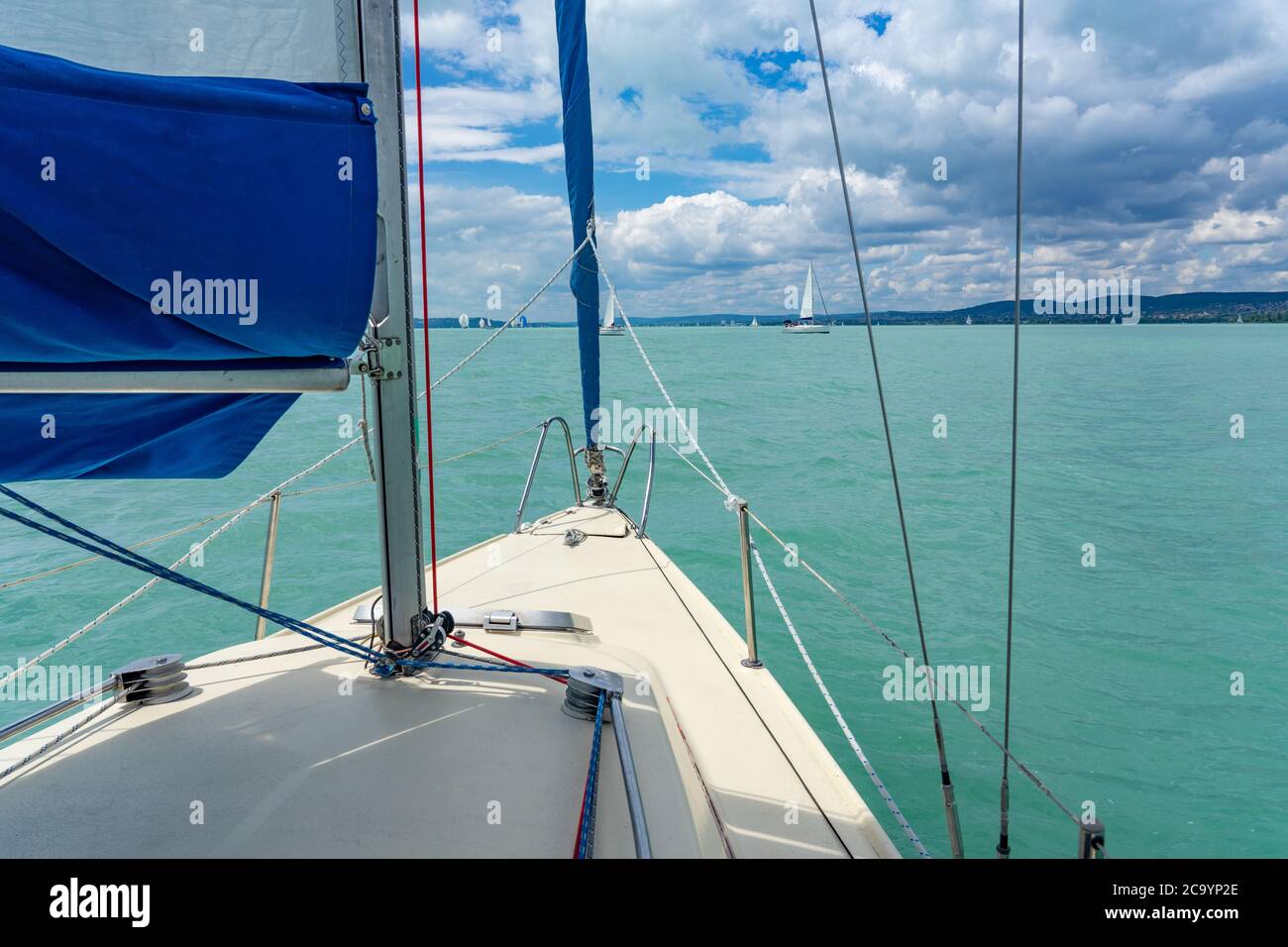 Sailboat on the lake Balaton ship prow view and other sailboats in the background Stock Photo