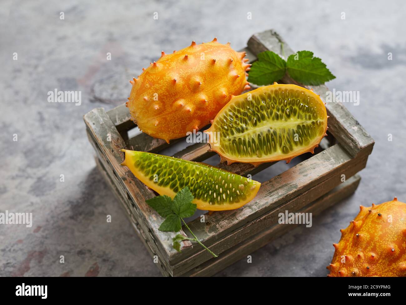 Kiwano fruits on crate Stock Photo Alamy