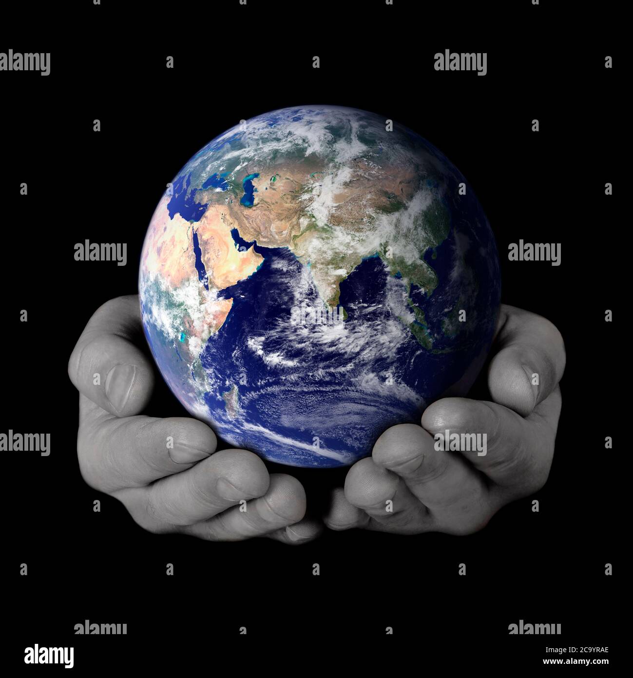 Black white hands holding globe hi-res stock photography and images - Alamy