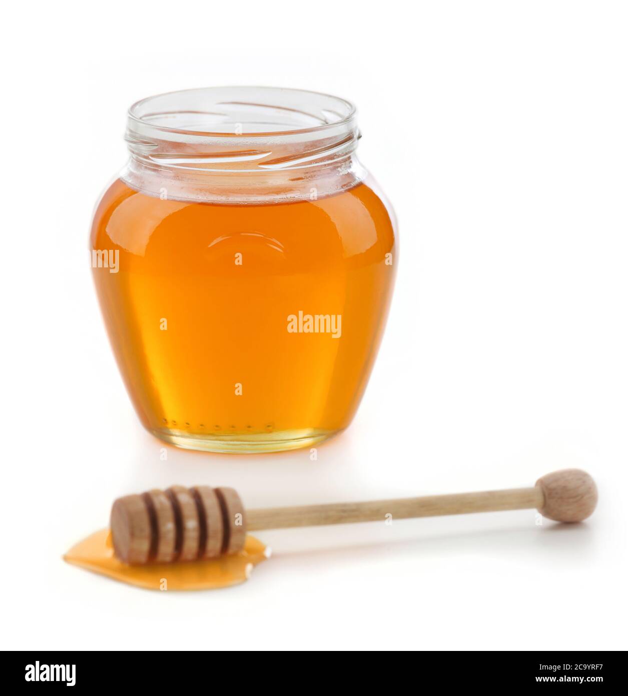 Honey jar and dipper isolated Stock Photo Alamy