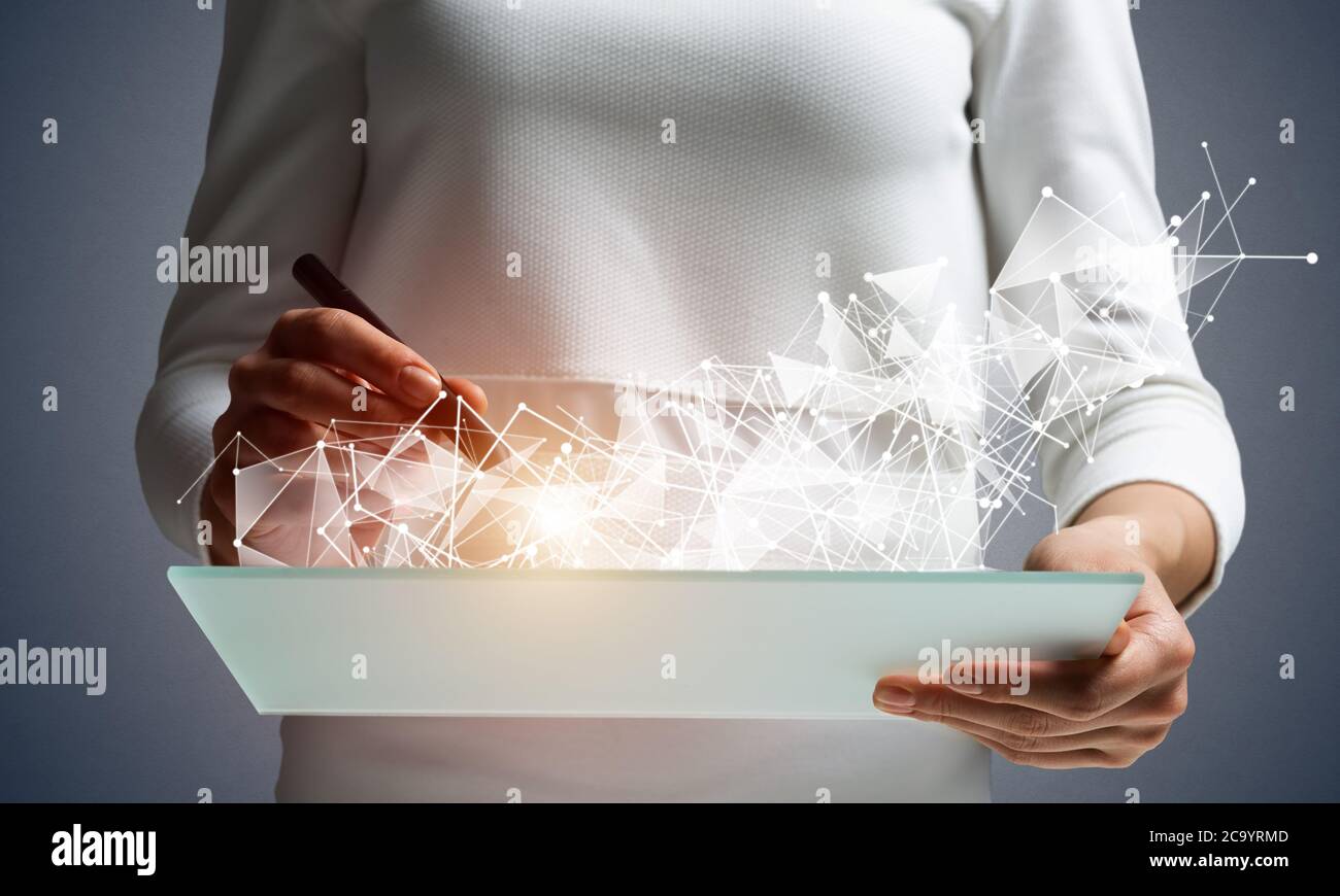 Businesswoman works with futuristic interface Stock Photo