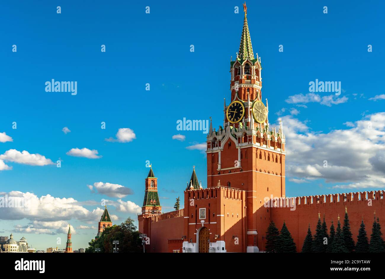 Moscow Kremlin on old Red Square in summer, Moscow, Russia. Is is famous tourist attraction of Moscow, top Russian landmark. Beautiful Spasskaya Tower Stock Photo