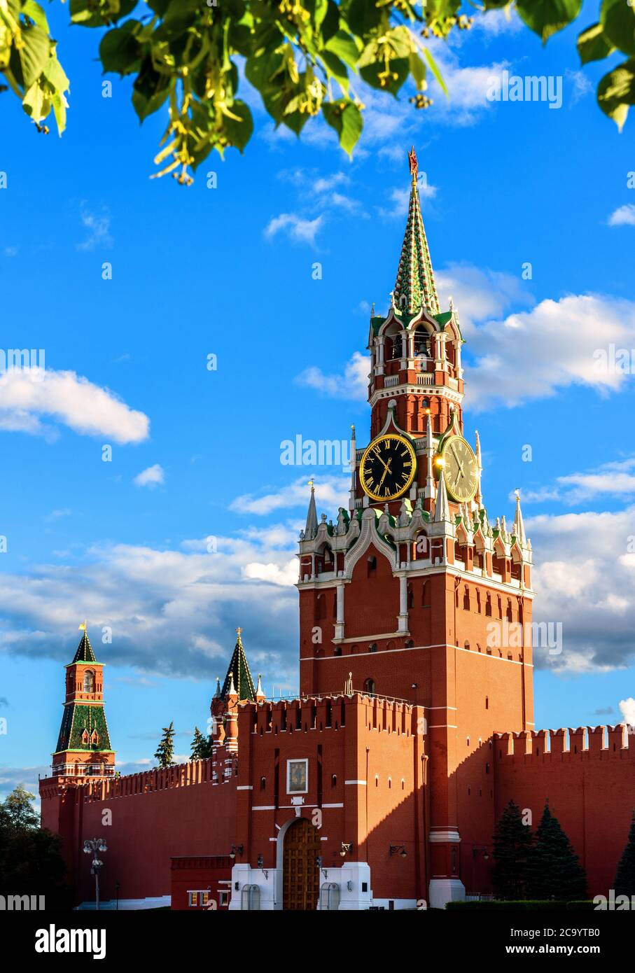 Moscow Kremlin on old Red Square in summer, Moscow, Russia. It is famous tourist attraction of Moscow, top Russian landmark. Beautiful Spasskaya Tower Stock Photo