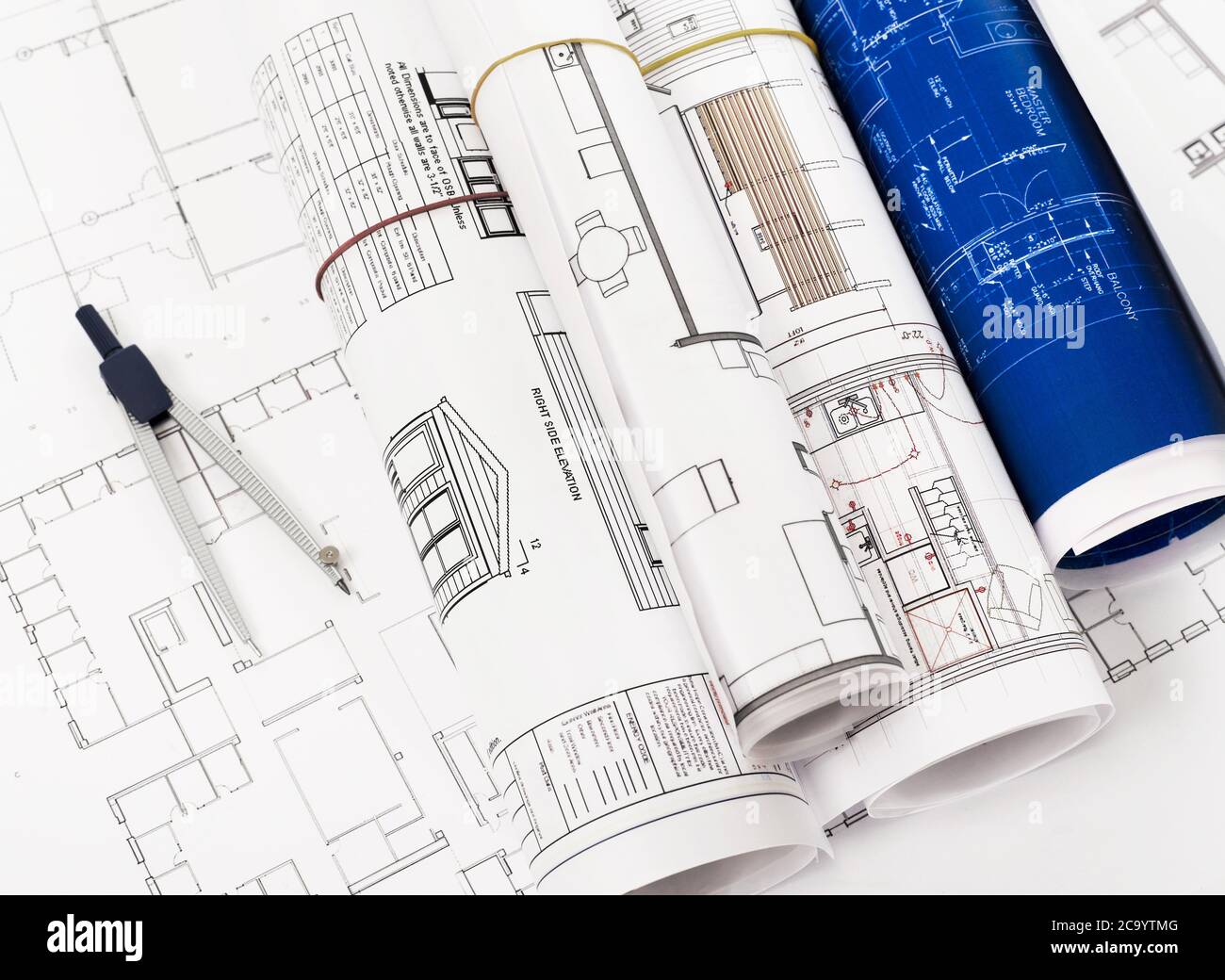 Blueprints and compass Stock Photo - Alamy
