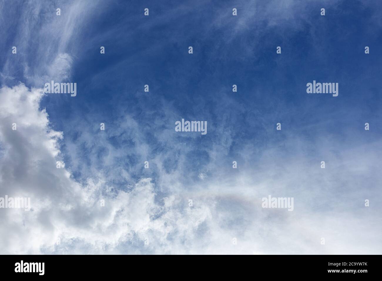 Cirrus clouds against a pale blue sky Stock Photo