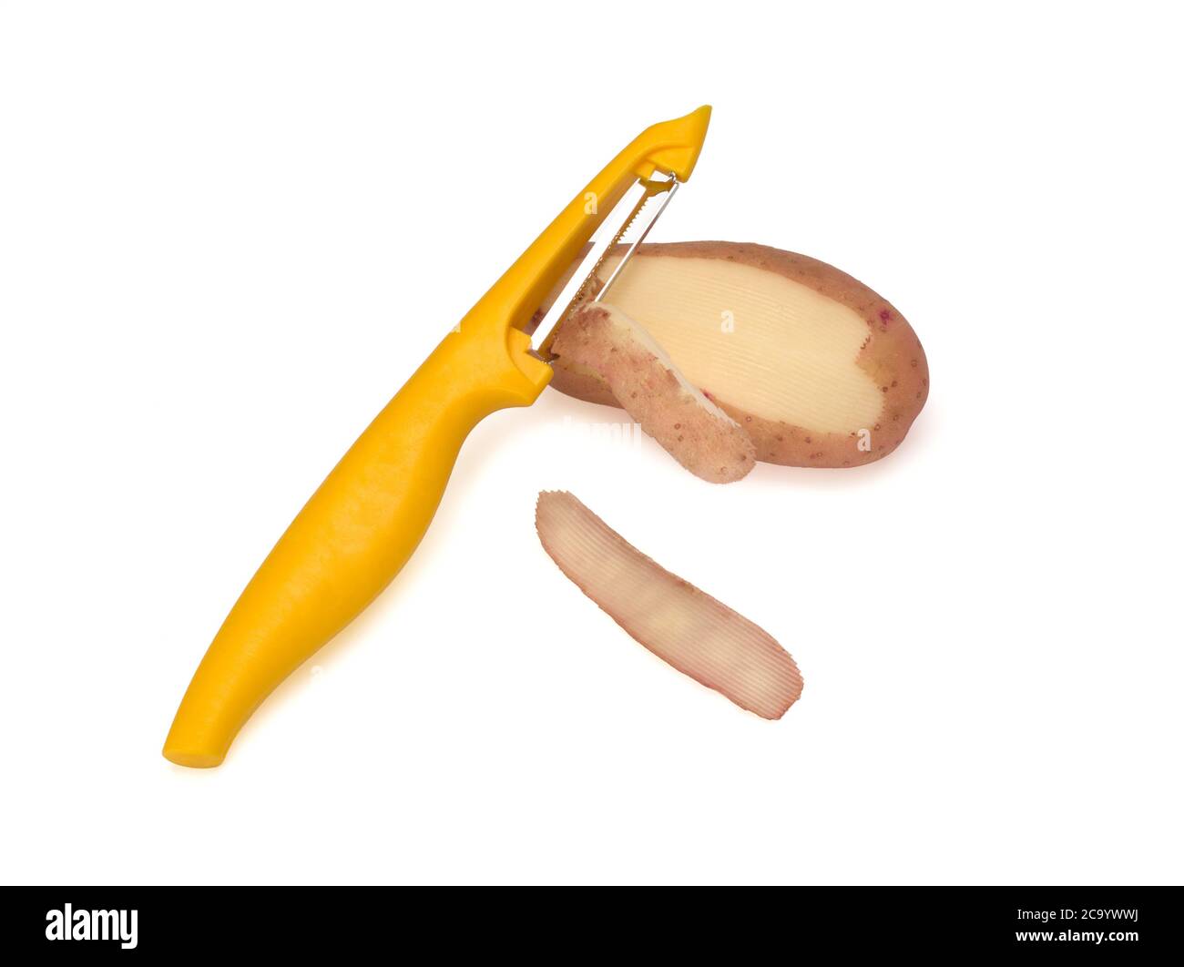 Yellow peeler, used to peel potatoes on white background. Knife, peeler