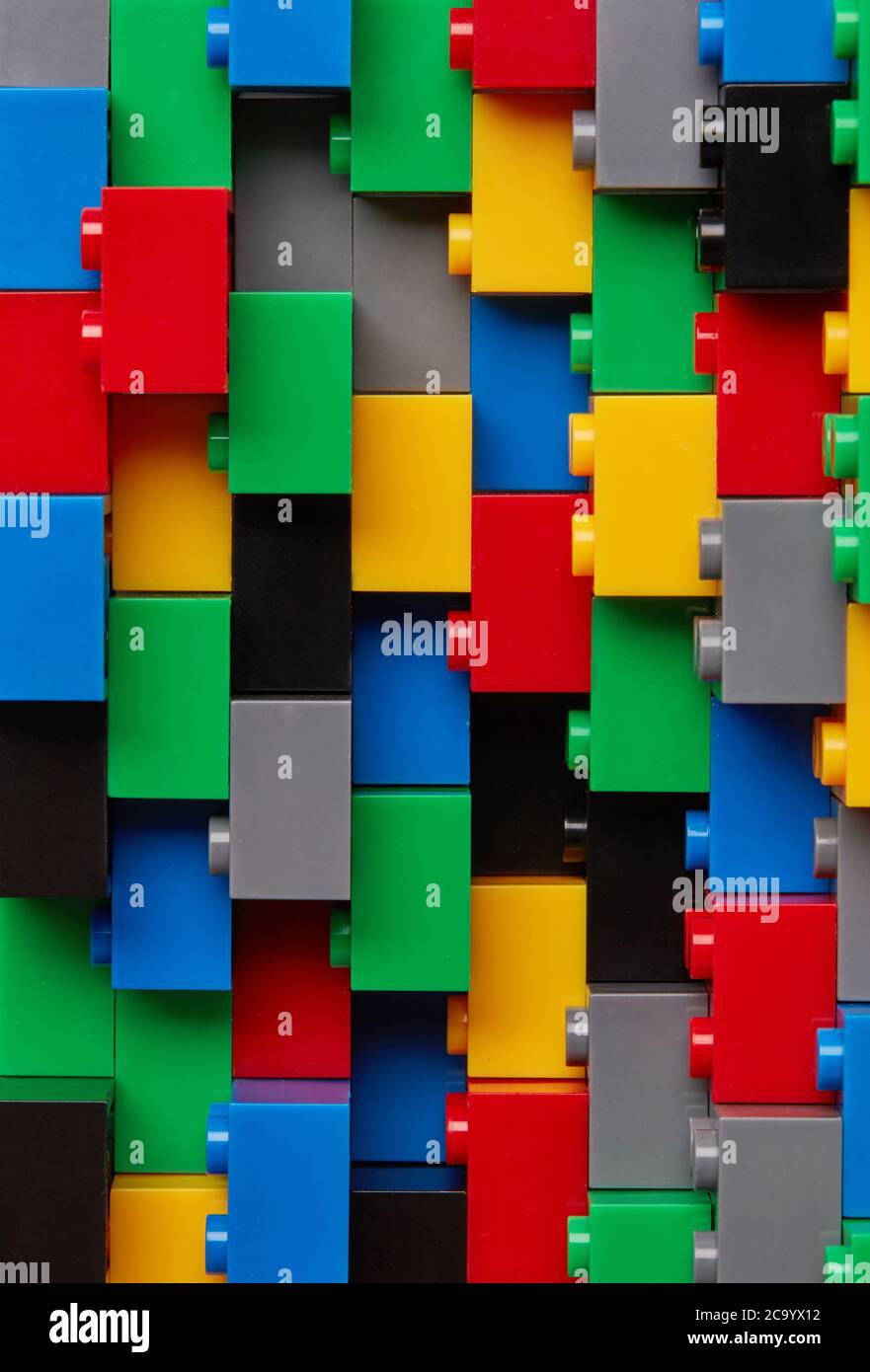 Plastic toy blocks on white background Stock Photo - Alamy