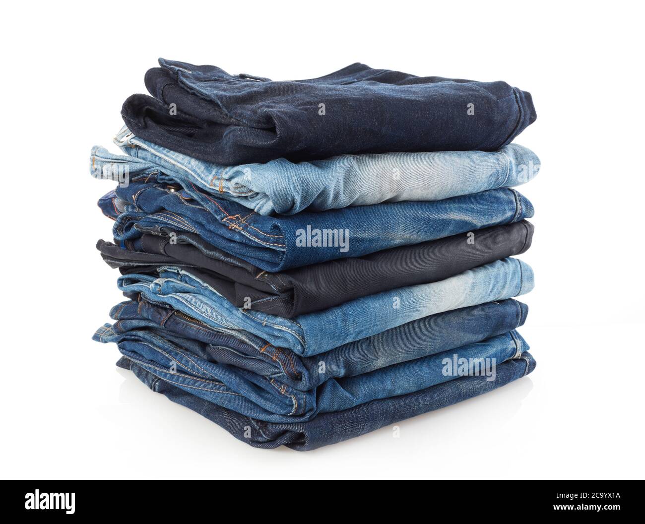 Pile of jeans isolated on white Stock Photo - Alamy
