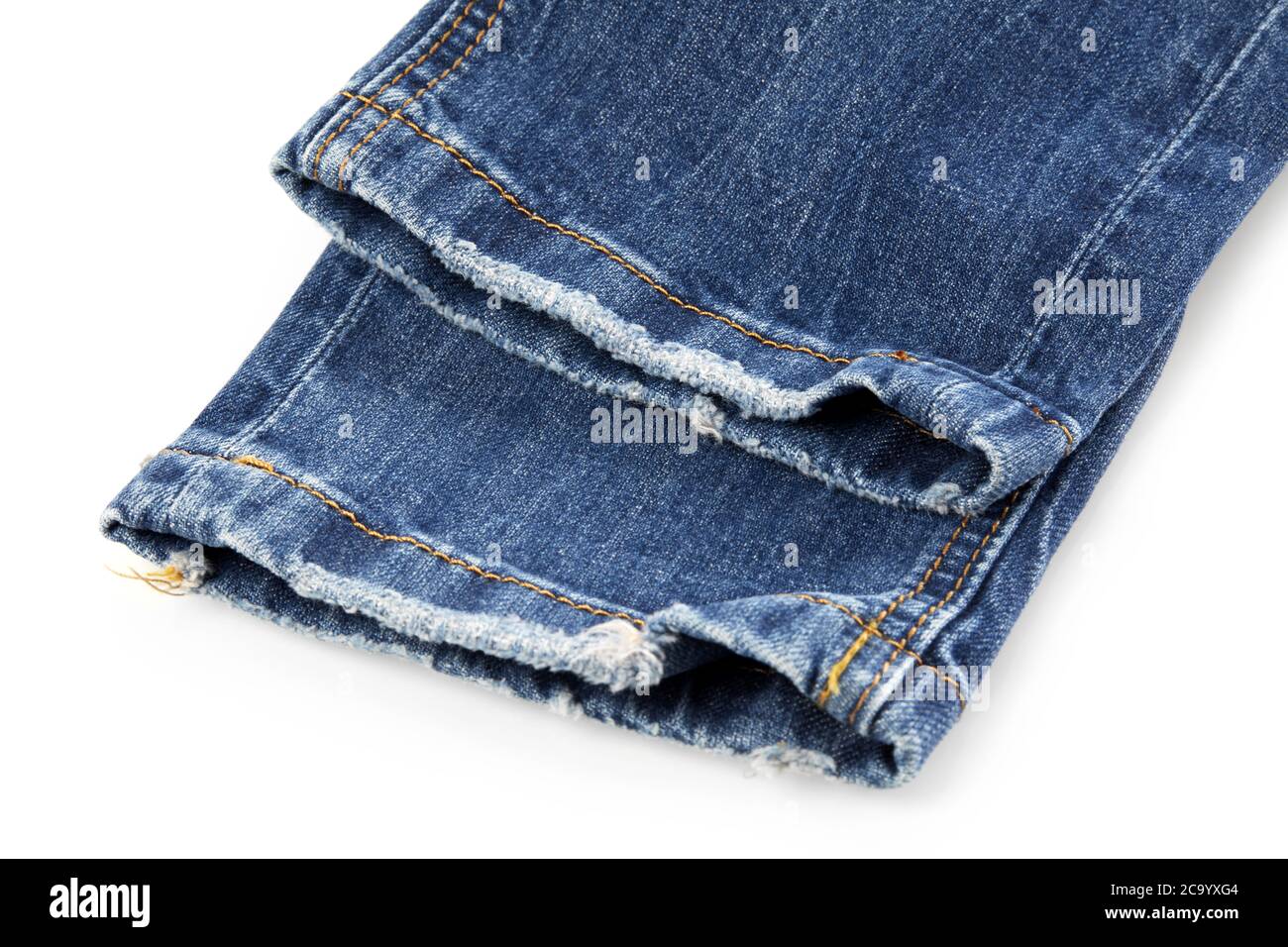 Used jeans legs isolated on white Stock Photo Alamy