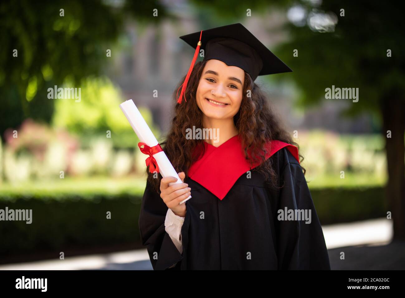 Female college graduate in cap and gown - Stock Image - F018/4992 - Science  Photo Library