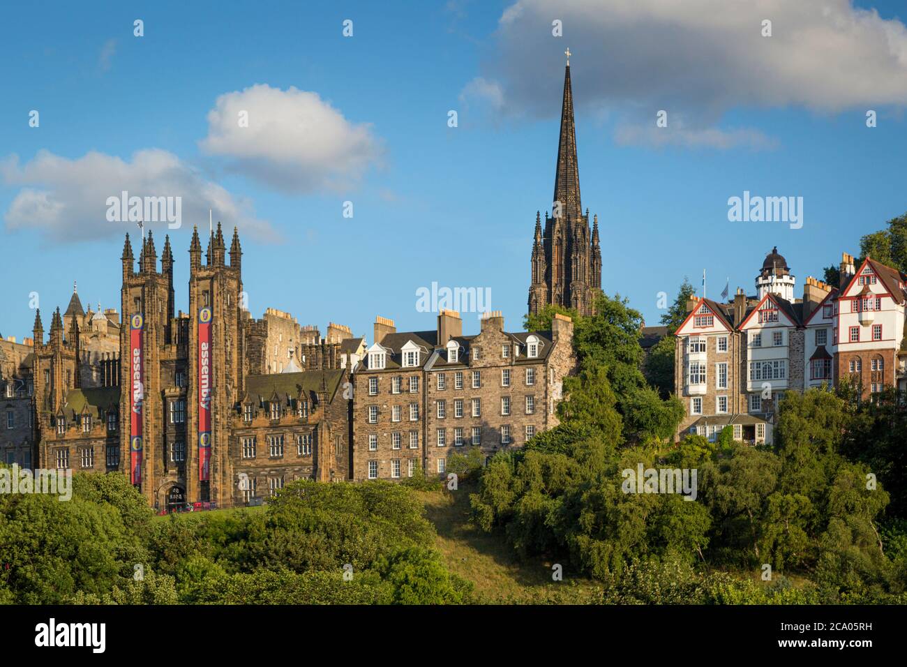 Church of Scotland and Tolbooth Church Towers rise above the buildings of old Edinburgh, Scotland, UK Stock Photo