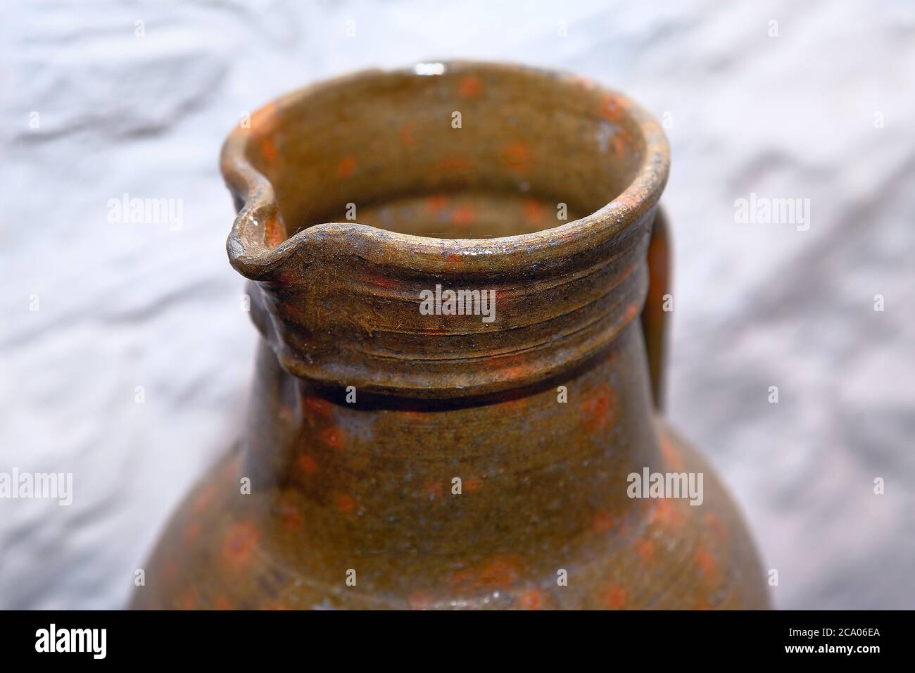 clay jug , old milk storage vessel Stock Photo