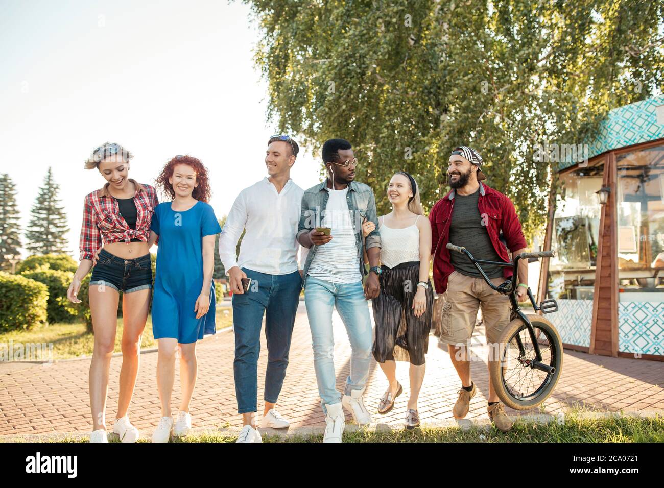 Portrait of multiethnic Hipster people having fun outdoor. Youth People