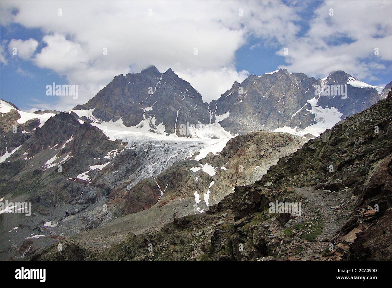 Bernina mountain chain, seen nearby refuge Bombardieri - Marinelli. Stock Photo