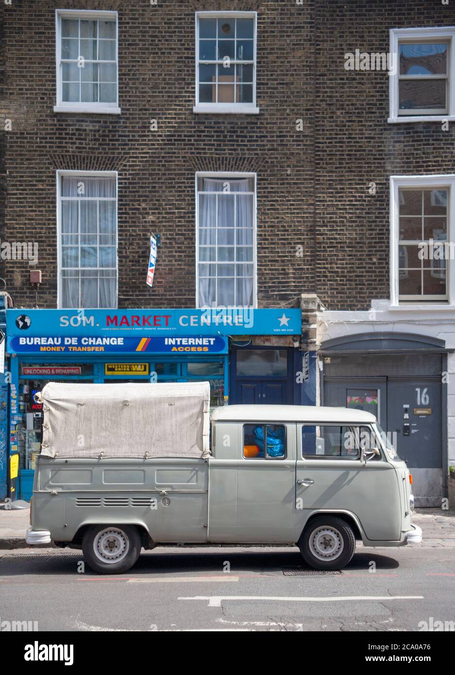 Converted, vintage Volkswagen camper van parked on a road in Camden, west London. England, U.K Photo -