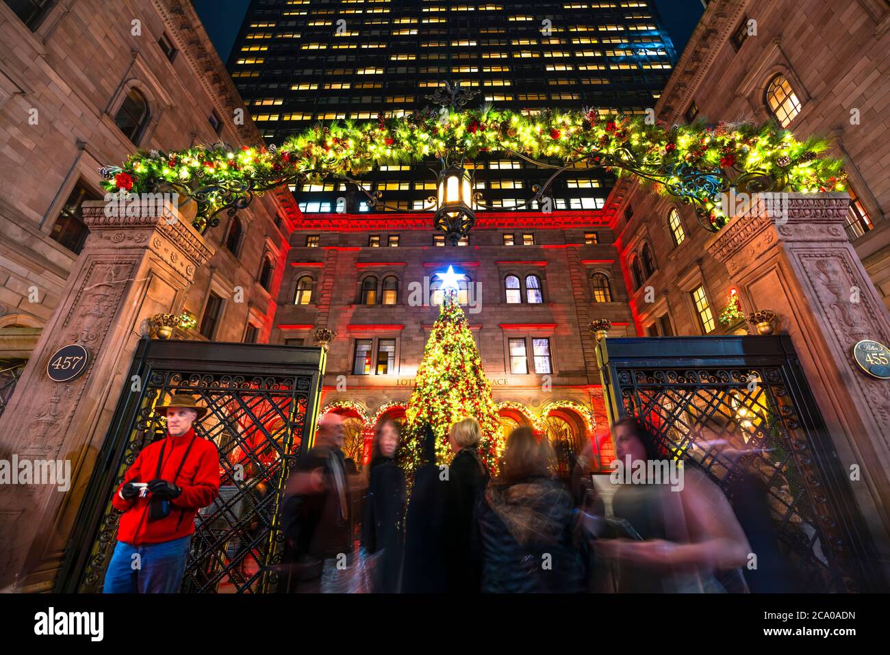 People enjoy seeing the Christmas tree of the Lotte New York Palace