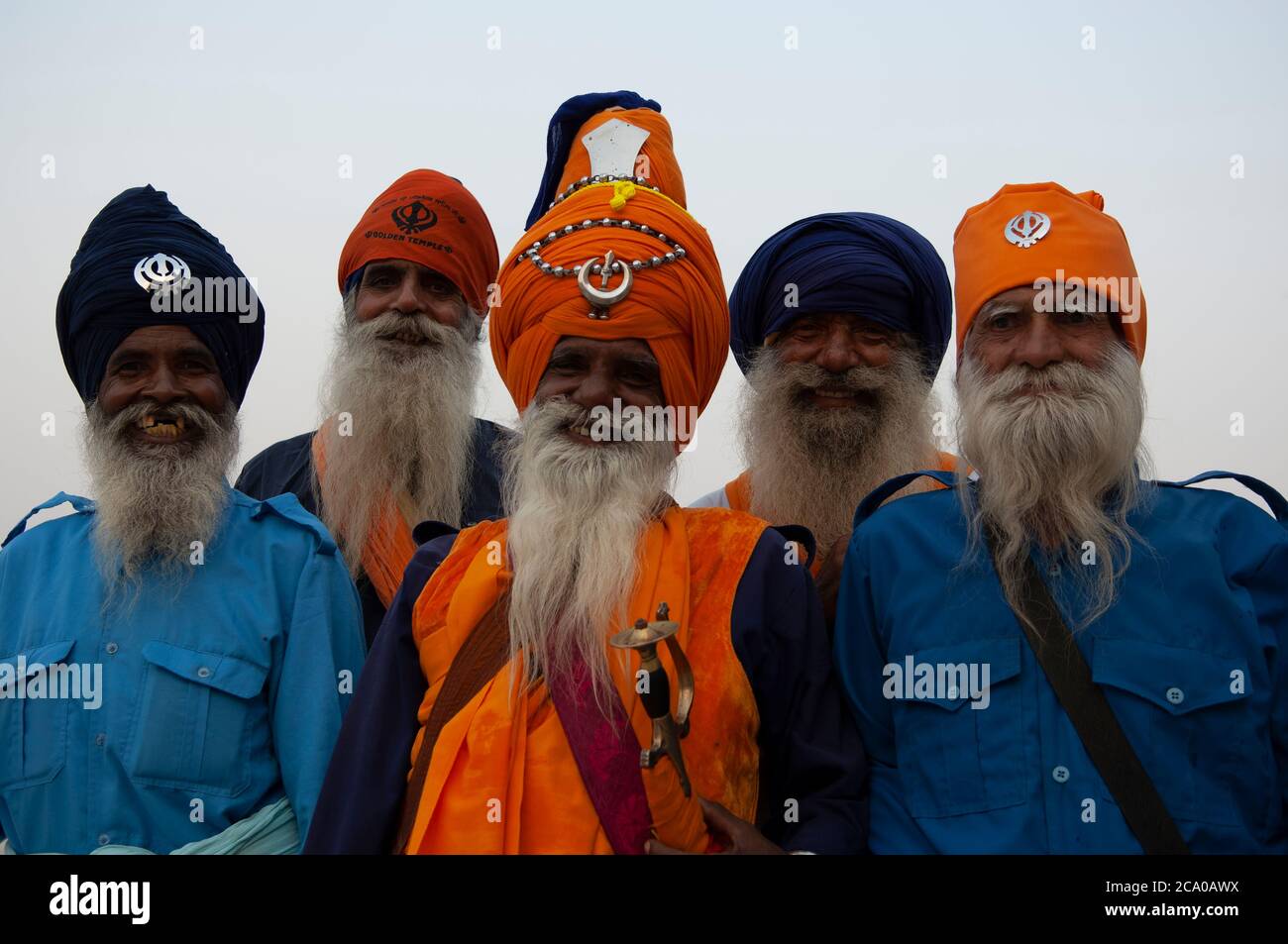 Smiling Sikh devotees on visit to the Golden Temple, Amritsar ,Punjab, India Stock Photo