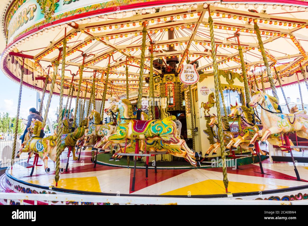 SOUTHPORT UNITED KINGDOM, 30 JUNE 2019 Horses on a golden gallopers ride at a traditional fairground Stock Photo