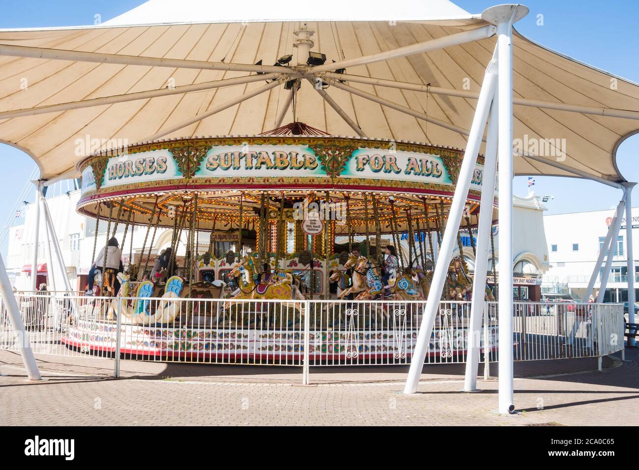 SOUTHPORT UNITED KINGDOM, 30 JUNE 2019 Horses on a golden gallopers ride at a traditional fairground Stock Photo