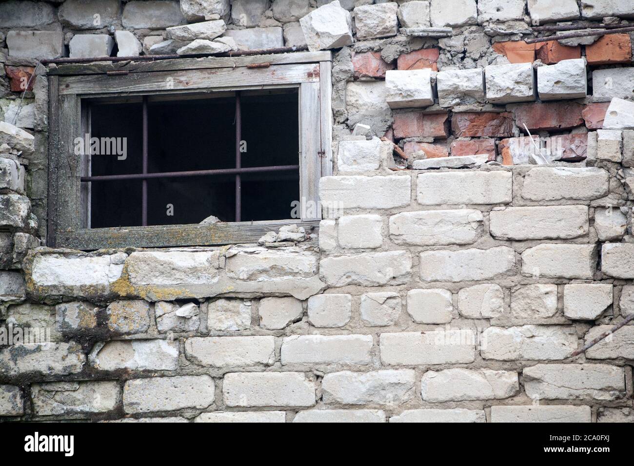 Real old brick wall crumbling from time to time Stock Photo