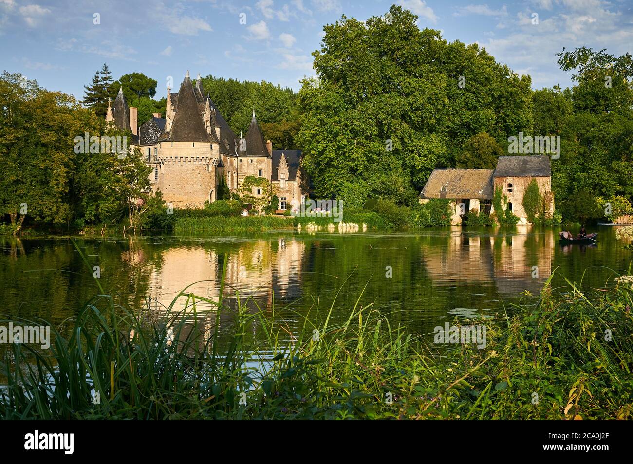The Chateau de Bazouges and watermill on the River Loir, France Stock Photo