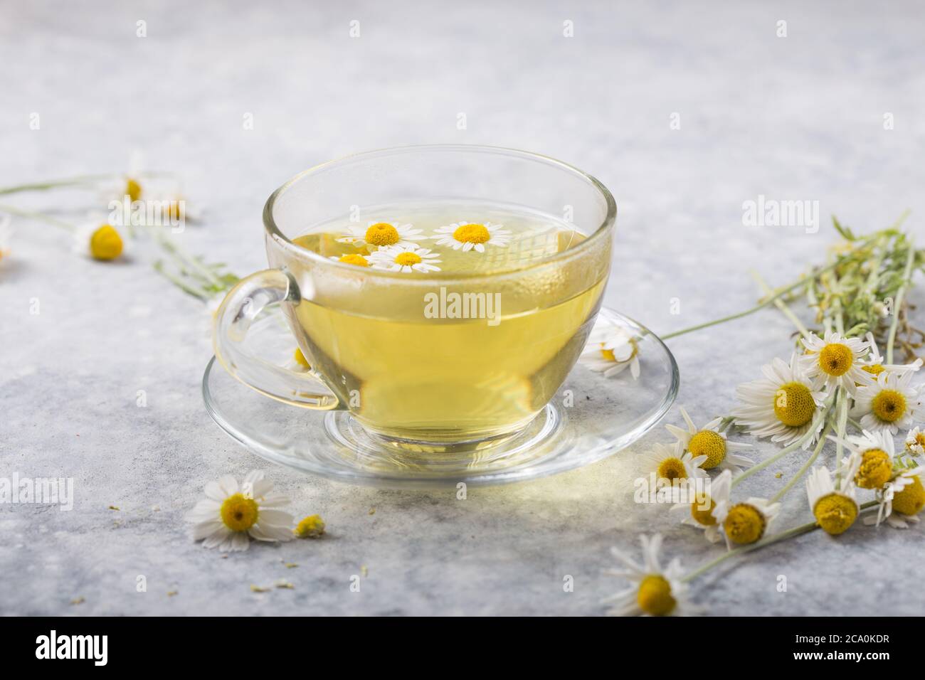 Chamomile Flowers And Chamomile Tea In Glass Teacup Top View Prevention Of Seasona Flu Colds Stock Photo Alamy