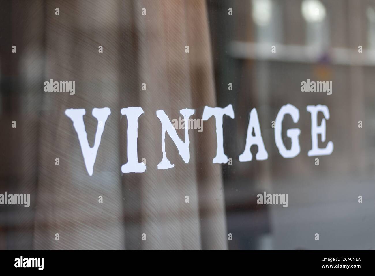 Vintage text on secondhand store window Stock Photo