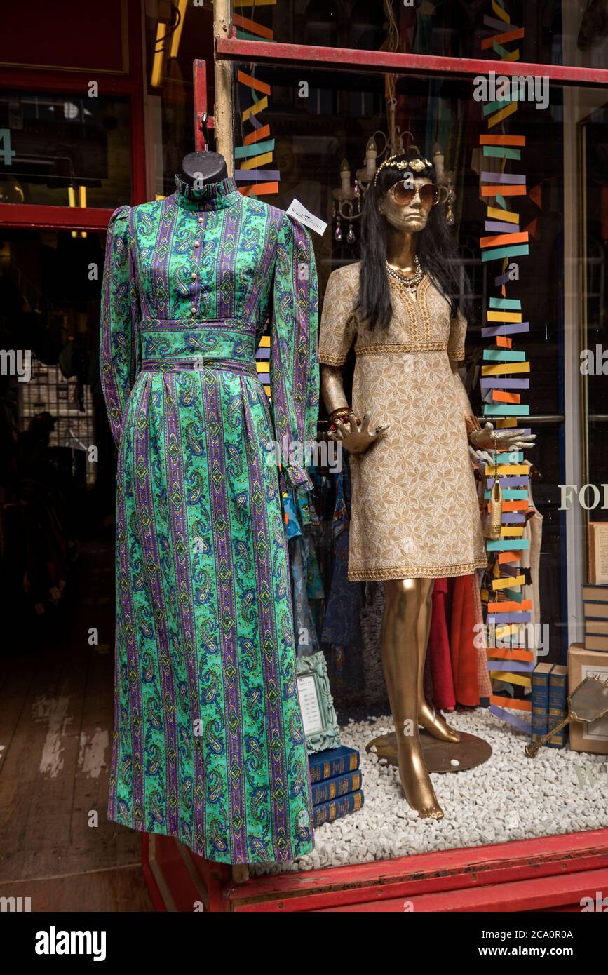 Vintage dresses on display at Armstrong's vintage clothing store in Teviot Place, Edinburgh, Scotland, UK. Stock Photo