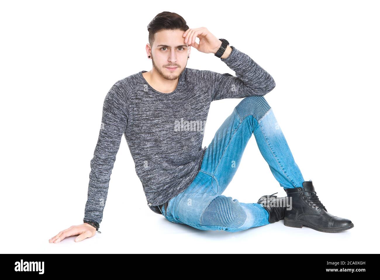 Man sitting with hand on head hi-res stock photography and images - Alamy