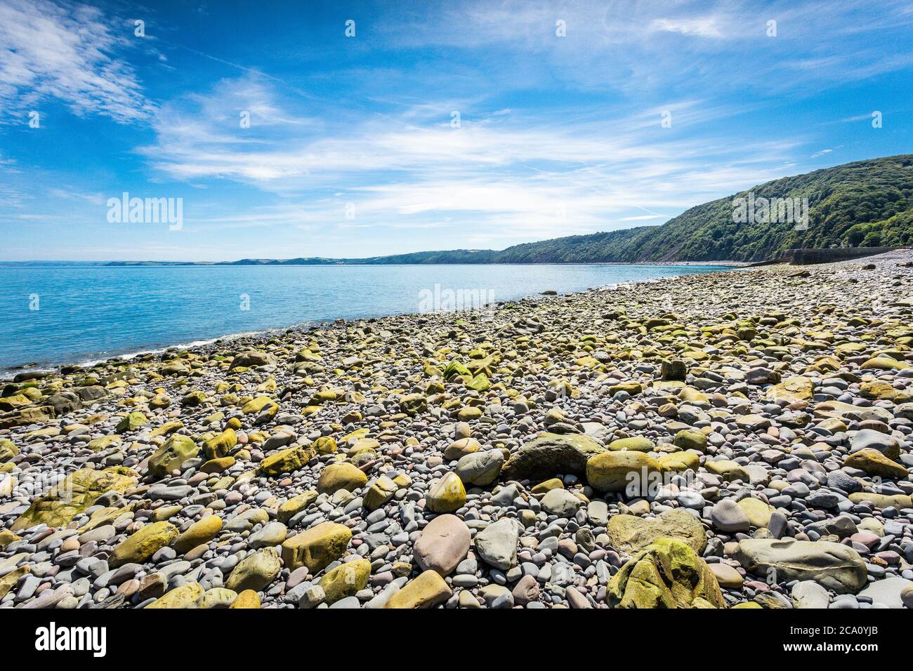 Rocky Shore In North Devon, Clovelly, Blue Sea & Sky Stock Photo