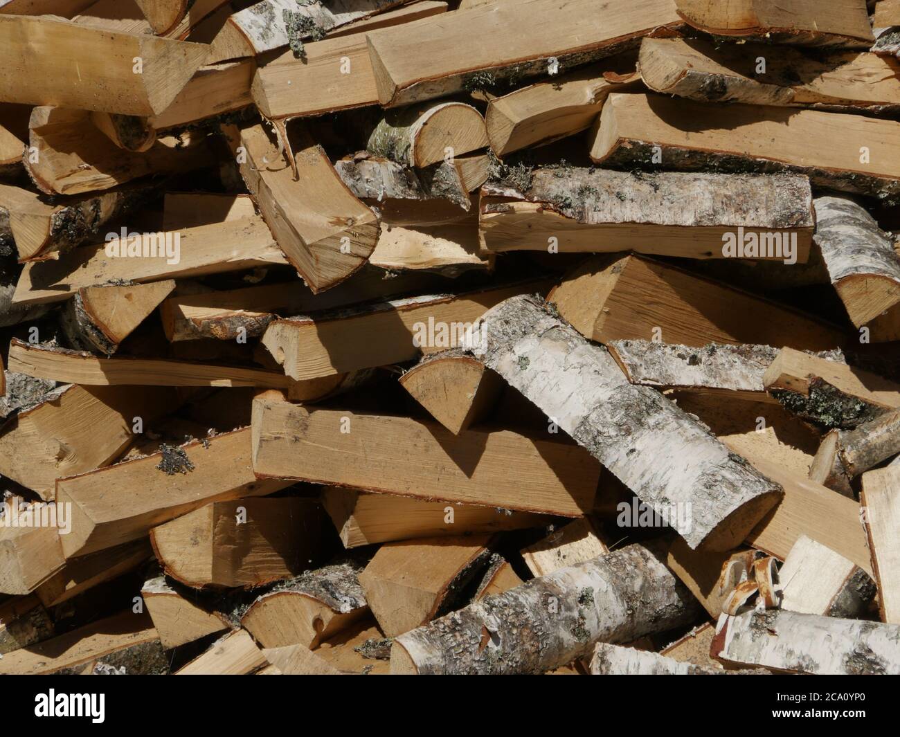 chopped birch firewood, heap, background Stock Photo