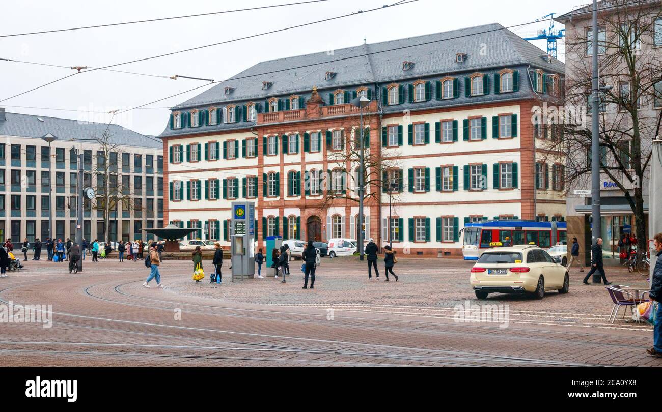 DARMSTADT, GERMANY - FEBRUARY 24, 2020: View of Luisenplatz (Louise Square) with the old Kollegiengebaude (College building) on a overcast day. Stock Photo