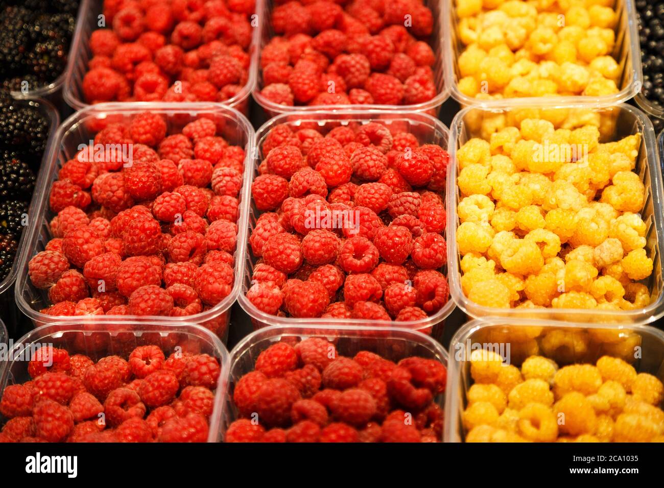 Colourful mix of different fresh berries at market Stock Photo