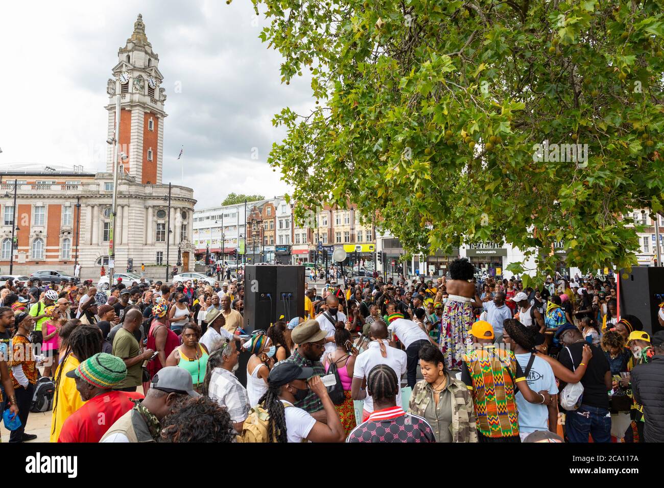 A large crowd in Windrush Square during the Afrikan Emancipation Day Reparations March, Brixton, London, 1 August 2020 Stock Photo