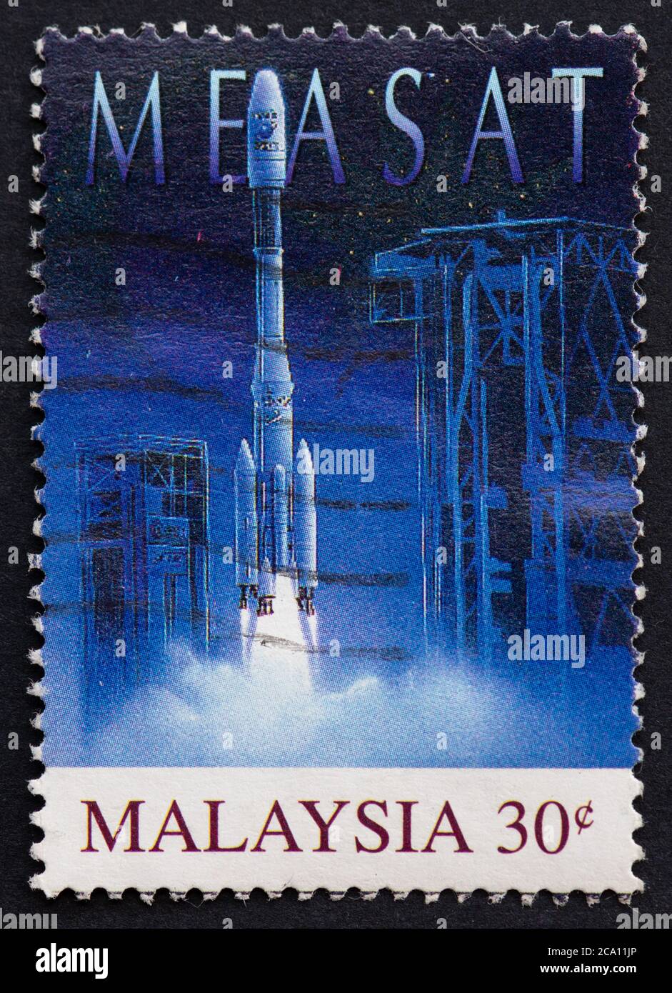 MEASAT - Malaysia East Asia Satellite - 30 c postage stamp - Malaysia 1996 Stock Photo