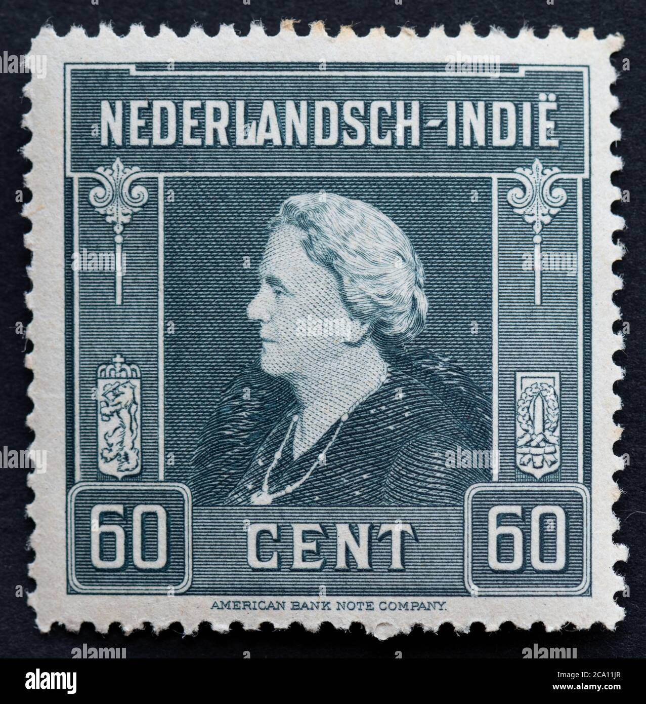 Queen Wilhelmina of the Netherlands on Dutch East Indies 60 cent postage stamp 1945 published by American Bank Note Company Stock Photo