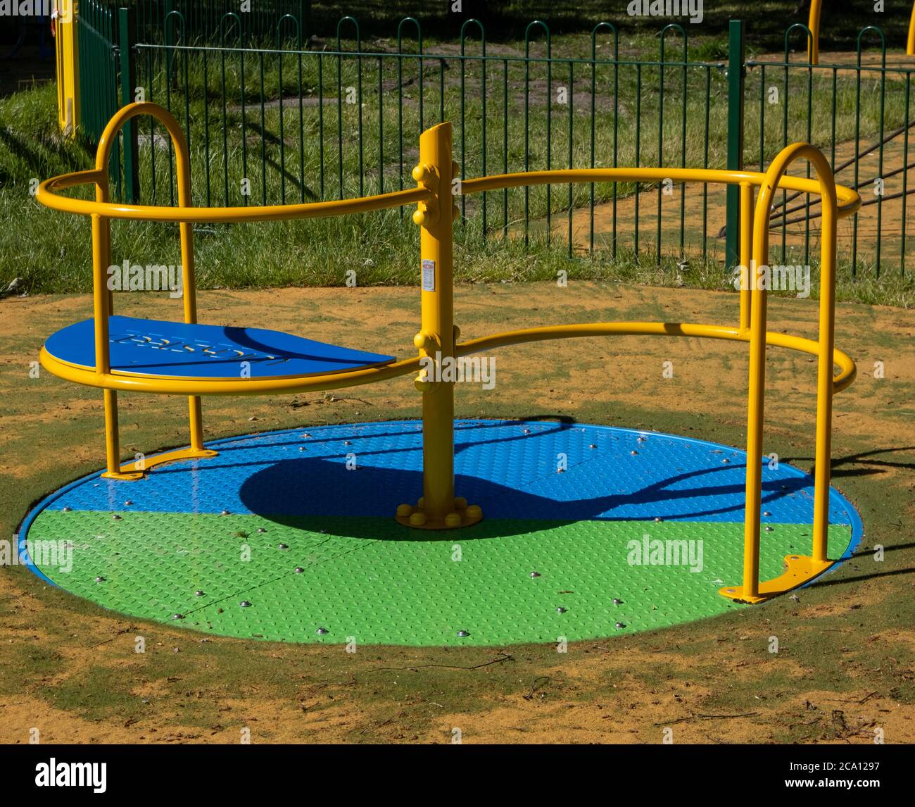 Small roundabout in chidlrens playground in Maghull May 2020 Stock