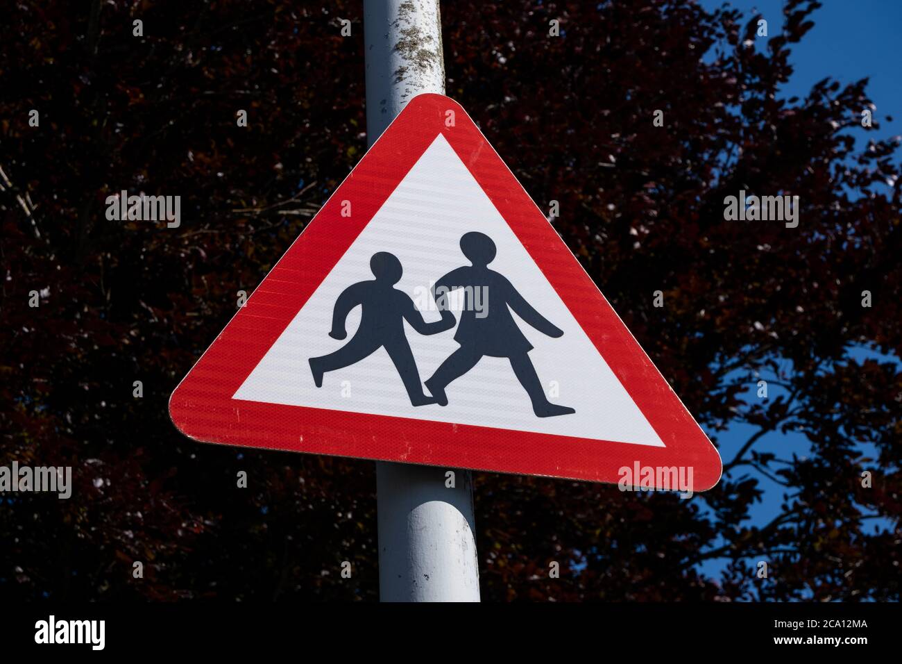 Street sign warning traffic of people crossing in Maghull May 2020 Stock Photo
