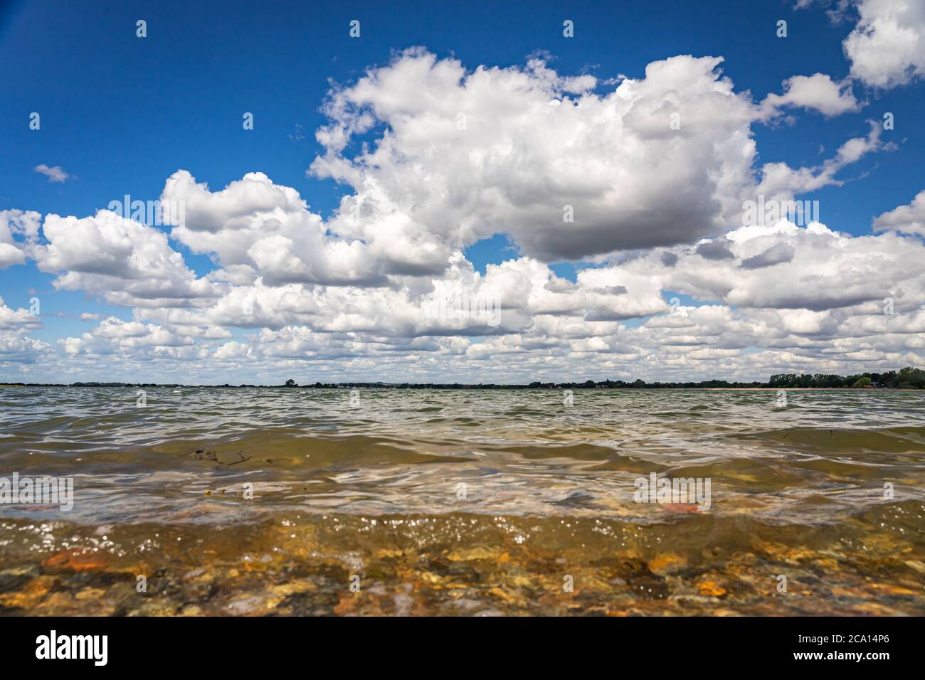 Gentle waves lapping the sea shore Stock Photo