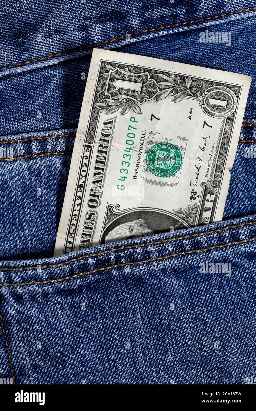 one dollar in jeans pocket Stock Photo