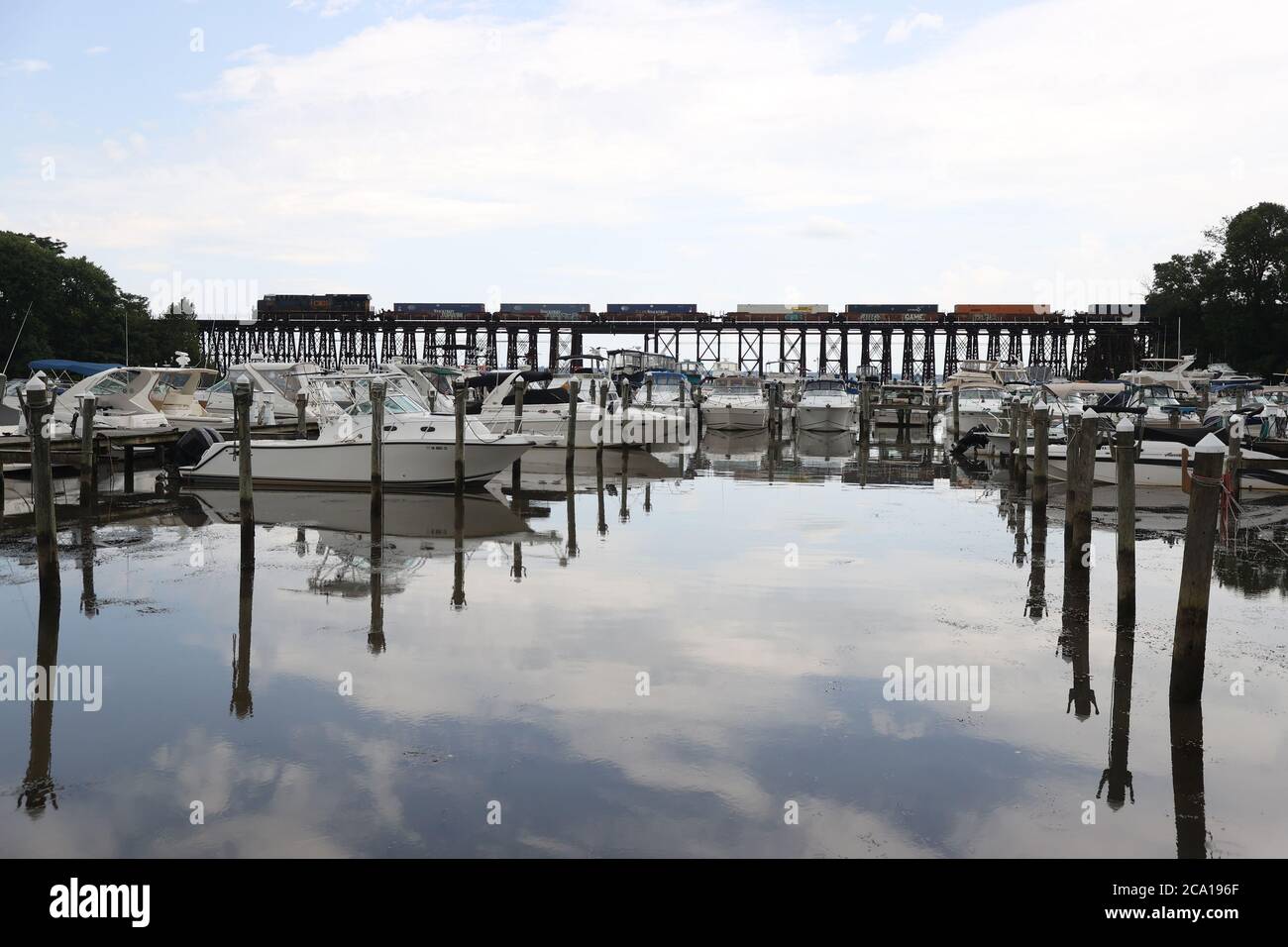Woodbridge, VA. 3rd Aug, 2020. Boats along the Neabsco Creek are lifted out of the water in advance of Tropical Storm Isiasis on August 3, 2020 in Woodbridge Virginia. Credit: Mpi34/Media Punch/Alamy Live News Stock Photo