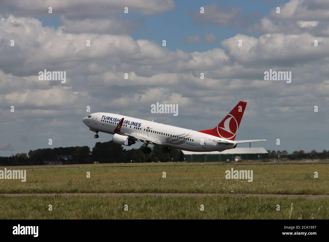 Aircraft is taking off from Amsterdam Schiphol airport from Polderbaan. Aircraft type Boeing 737 NG / Max signname .TC-JGU airliner THY Turkish Airlin Stock Photo