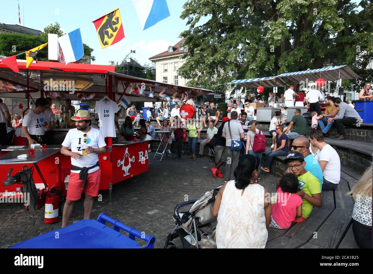 Zug / Switzerland - August 01 2016: Celebration of Swiss National Day (1st of August) in the city centre of Zug - old town, located at the lake Stock Photo
