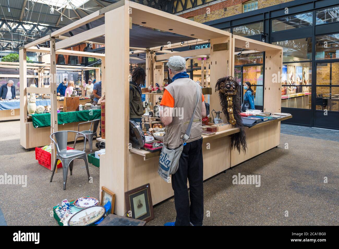 market-goers-browse-the-stalls-at-the-old-spitalfields-thursday