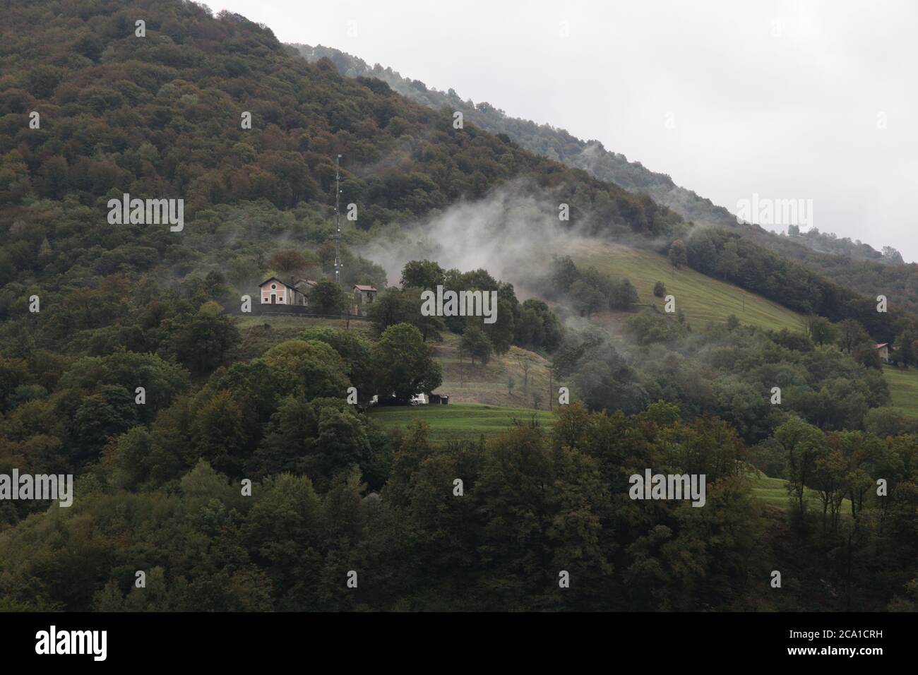 Casima, Canton Ticino (TI)/ Switzerland - September 29 2013: Vilage Casima in Canton Ticino, located in the valley Muggio on a foggy autumn day Stock Photo