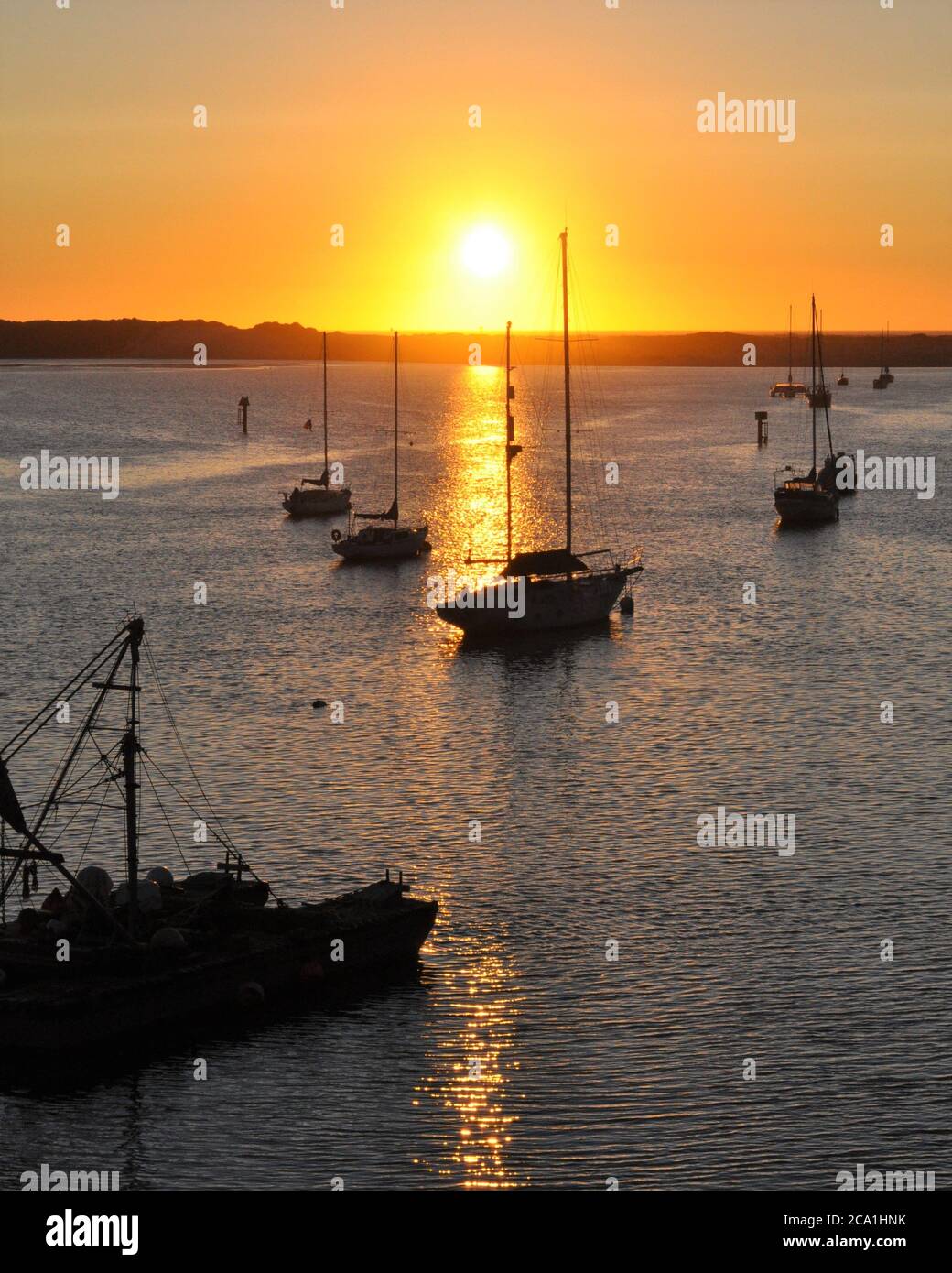 Sundown with boats hi-res stock photography and images - Alamy