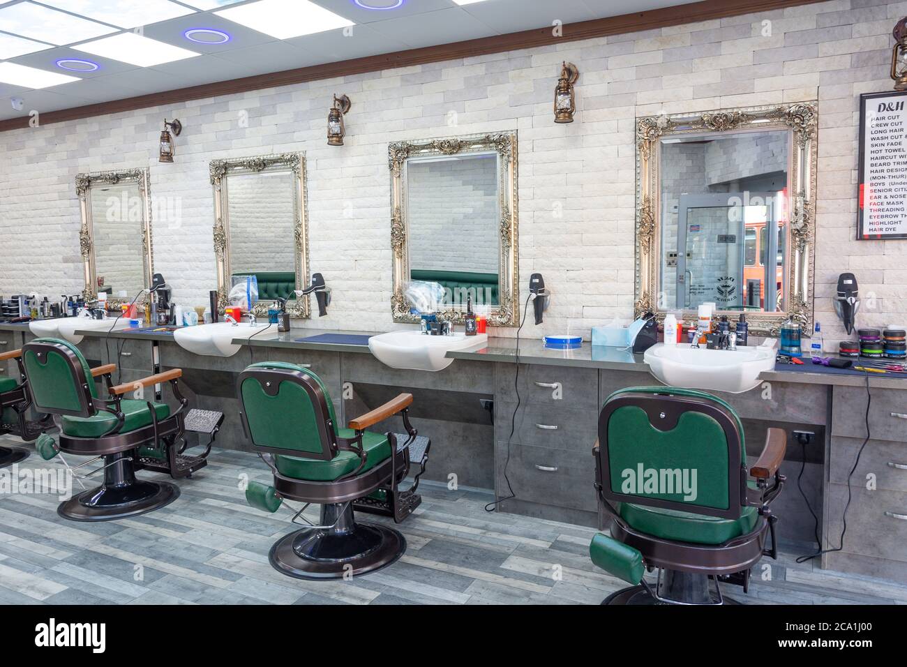 Interior of men's hairdressers, Wrythe Lane, Rosehill, London Borough of Sutton, Greater London, England, United Kingdom Stock Photo